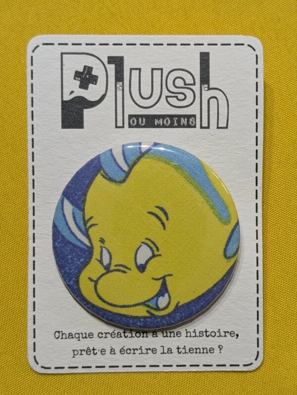 Badge "Partir là-bas"